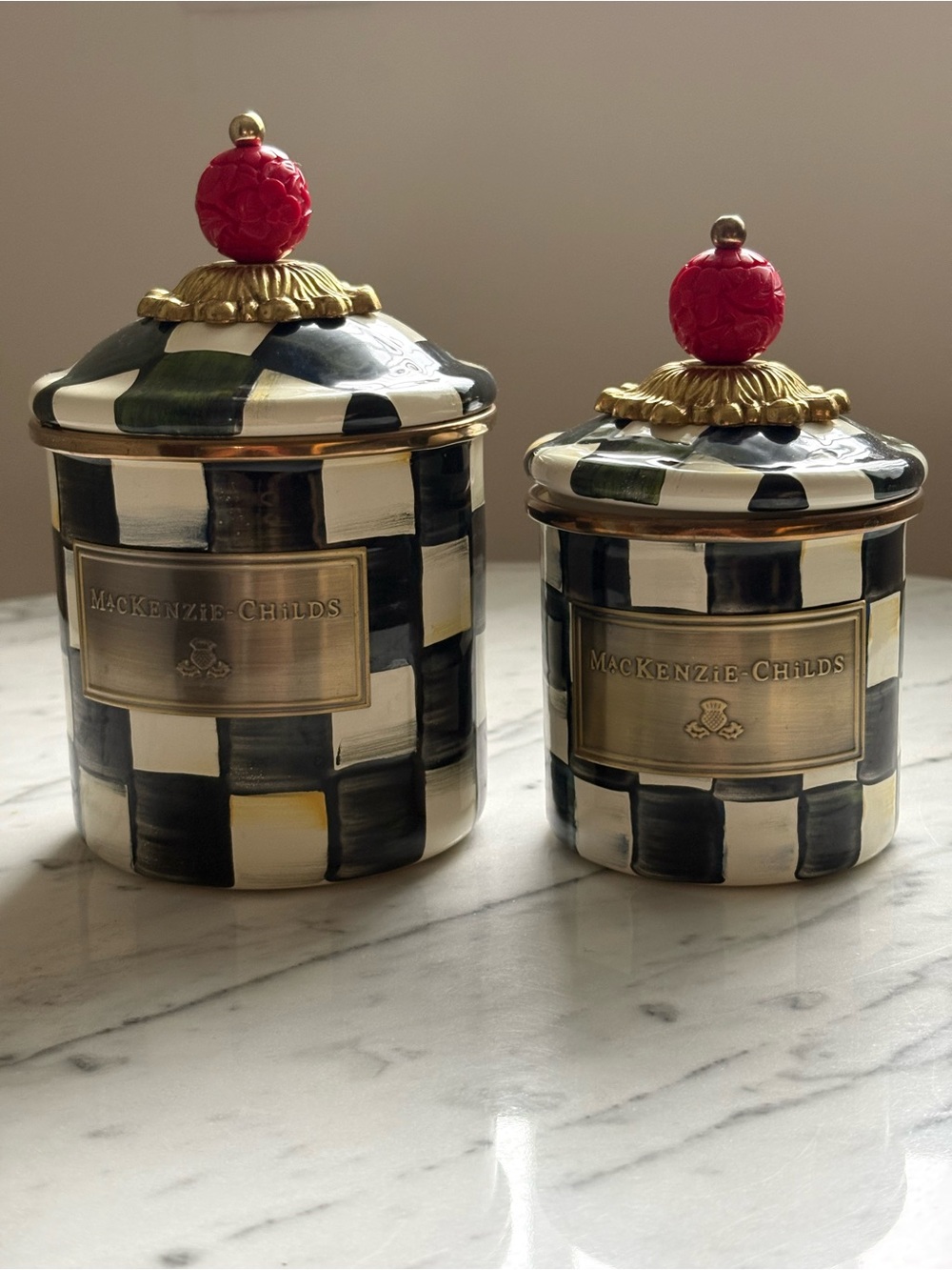 MacKenzie-Childs Black & White Check Canisters with Gold Accents and Red Finials